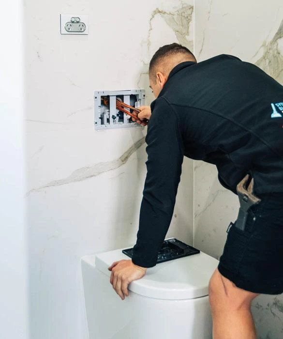 installing a wall-hung toilet through a small opening